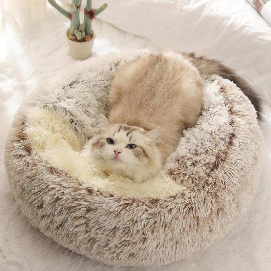 Cama redonda para mascotas con interior esponjoso calmante