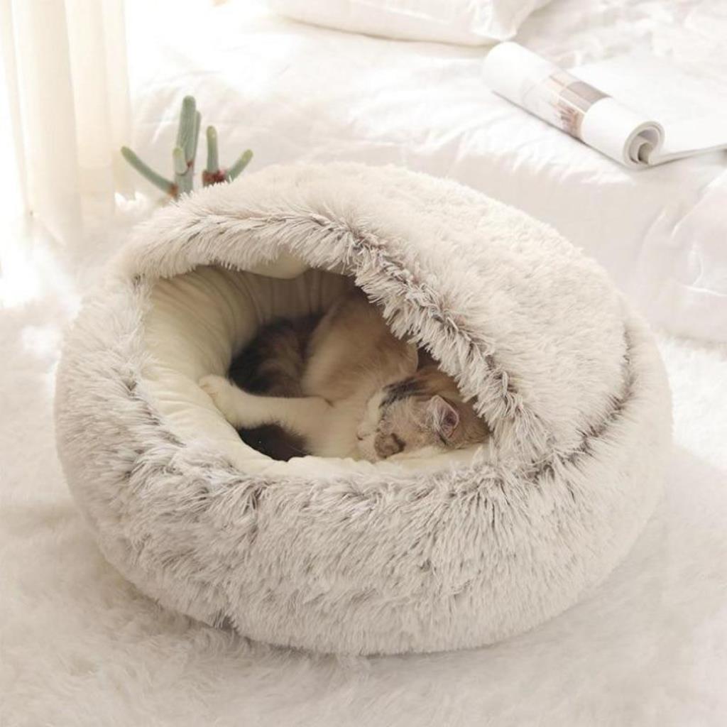 Cama redonda para mascotas con interior esponjoso calmante