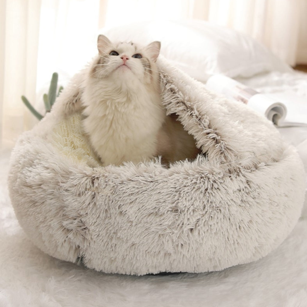 Cama redonda para mascotas con interior esponjoso calmante